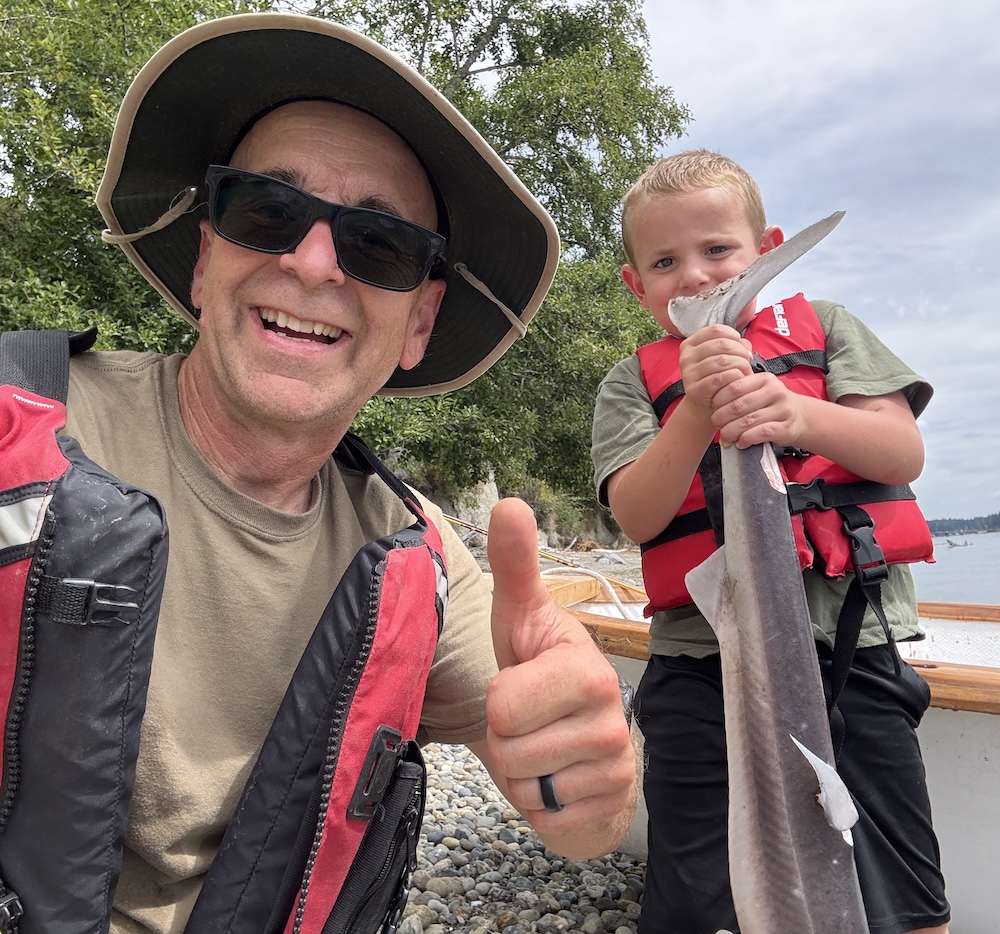Brad with his grandson and a dogfish